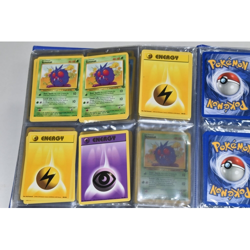 610 - FOLDER OF POKEMON CARDS, includes cards from Base Set, Jungle Set and Fossil set, card condition var... 