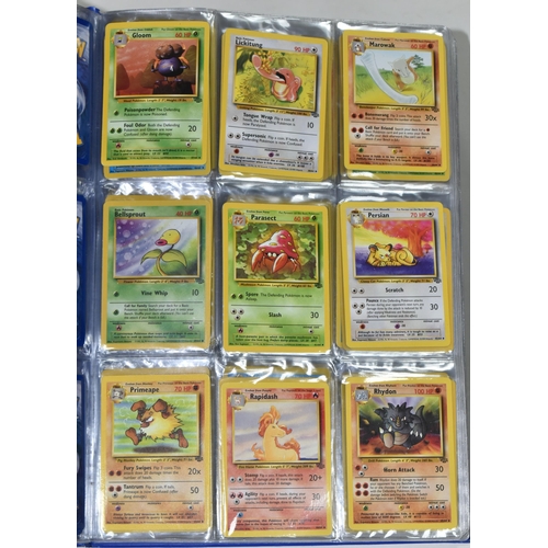 610 - FOLDER OF POKEMON CARDS, includes cards from Base Set, Jungle Set and Fossil set, card condition var... 