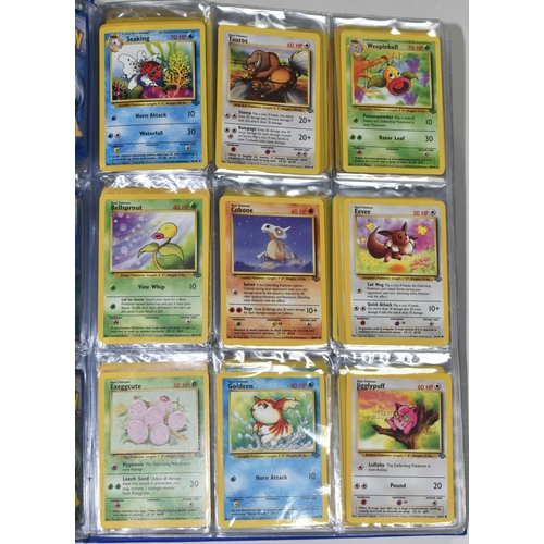 610 - FOLDER OF POKEMON CARDS, includes cards from Base Set, Jungle Set and Fossil set, card condition var... 