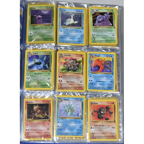 610 - FOLDER OF POKEMON CARDS, includes cards from Base Set, Jungle Set and Fossil set, card condition var... 