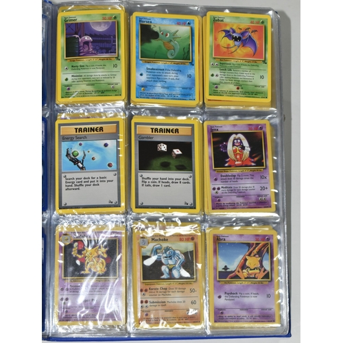 610 - FOLDER OF POKEMON CARDS, includes cards from Base Set, Jungle Set and Fossil set, card condition var... 