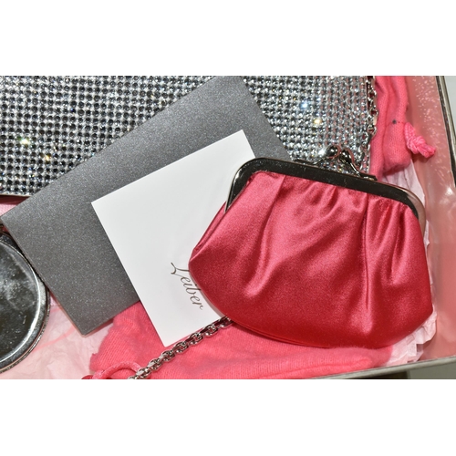 616 - A BOXED JUDITH LEIBER DOUBLE SIDED SILVER DIAMANTE BAG, with grey satin exterior and pink satin inte... 