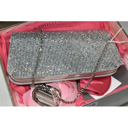 616 - A BOXED JUDITH LEIBER DOUBLE SIDED SILVER DIAMANTE BAG, with grey satin exterior and pink satin inte... 