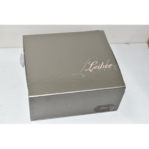 616 - A BOXED JUDITH LEIBER DOUBLE SIDED SILVER DIAMANTE BAG, with grey satin exterior and pink satin inte... 