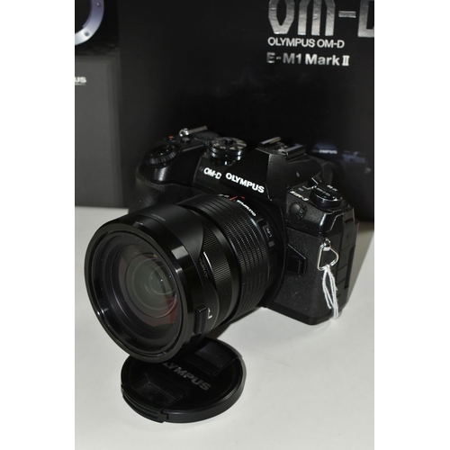 623 - A BOXED OLYMPUS OM-D E-M1 MARK II WITH 12-40MM F2.8 ZOOM LENS, together with an Olympus battery char... 