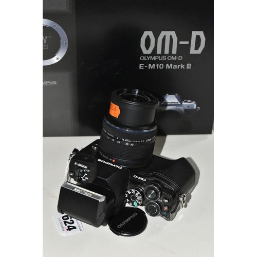 624 - A BOXED OLYMPUS OM-D E-M10 III WITH A 14-42 F3.5-5.6 ZOOM LENS, together with an Olympus battery,  a... 