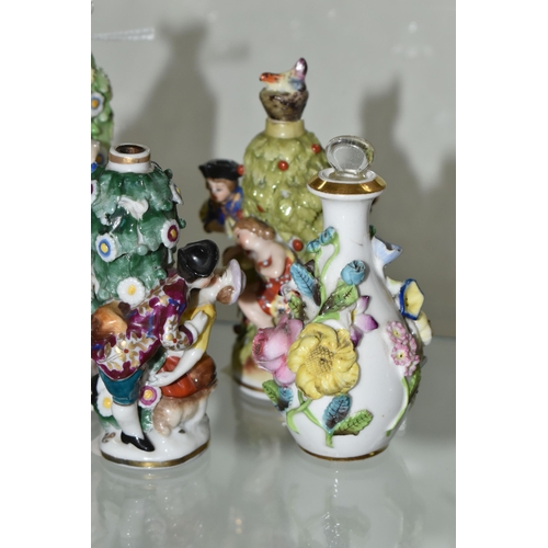 627 - FIVE LATE 19TH AND 20TH CENTURY CONTINENTAL PORCELAIN SCENT BOTTLES, three of figural form with encr... 