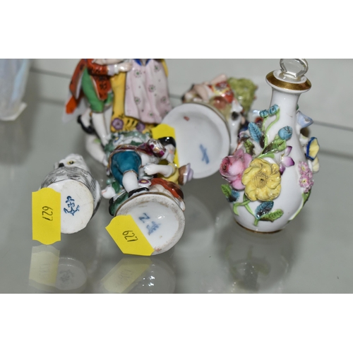 627 - FIVE LATE 19TH AND 20TH CENTURY CONTINENTAL PORCELAIN SCENT BOTTLES, three of figural form with encr... 