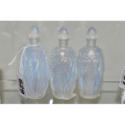 629 - THREE SABINO OPALESCENT SCENT BOTTLES, each having the same moulded design of Neo-Classical female f... 