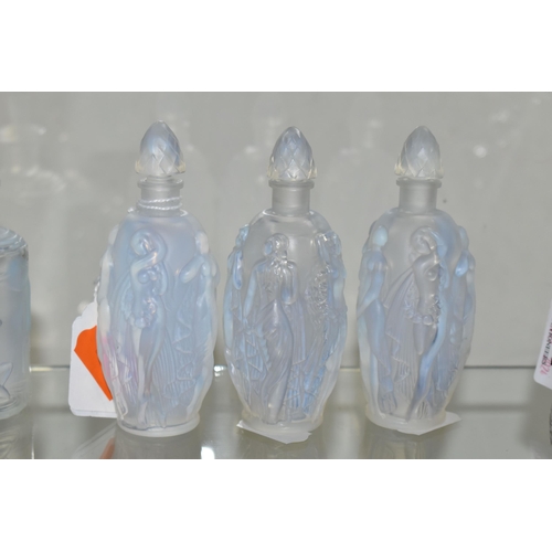 629 - THREE SABINO OPALESCENT SCENT BOTTLES, each having the same moulded design of Neo-Classical female f... 