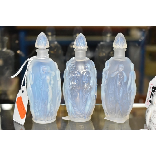 629 - THREE SABINO OPALESCENT SCENT BOTTLES, each having the same moulded design of Neo-Classical female f... 