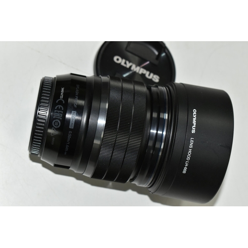 648 - AN OLYMPUS 45MM F1.2 PRO LENS, complete with lens hood and lens caps, Condition Report: lens appears... 