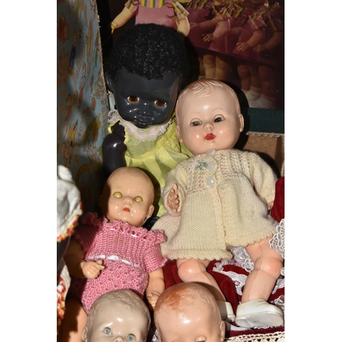 651 - ONE BOX OF VINTAGE DOLLS, to include a 1950's boxed Palitoy walking doll in original dress and shoes... 