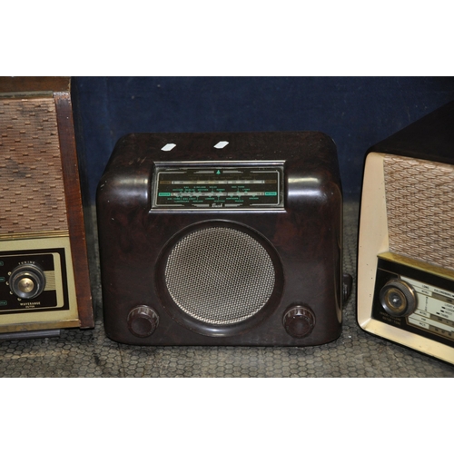 1053 - A TRAY CONTAINING THREE VINTAGE RADIOS including an Ekco Model Y319 valve radio with brown Bakelite ... 