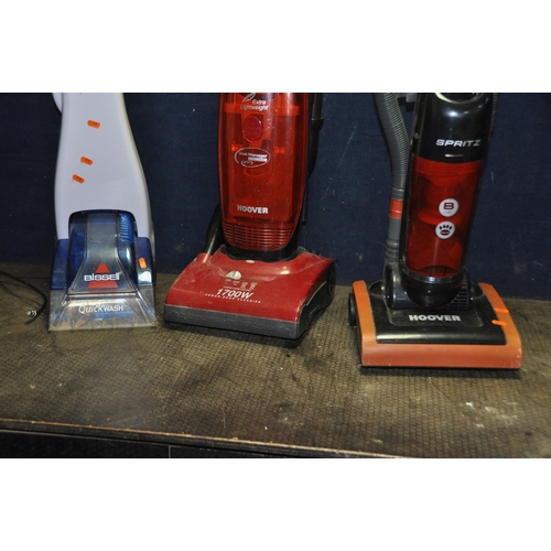 1056 - A HOOVER SPRITZ VACUUM CLEANER, a Hoover upright vacuum cleaner and a Bissell carpet washer (all PAT... 