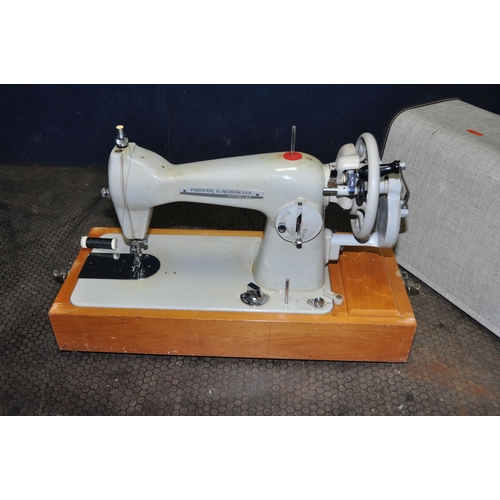 1075 - A FRISTER & ROSSMAN MODEL 25 MANUAL SEWING MACHINE with cover (handle to top missing)