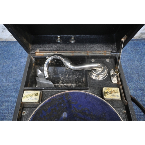 1248 - A VINTAGE WIND UP PORTABLE LINGUAPHONE RECORD PLAYER, with accompanying educational material (condit... 