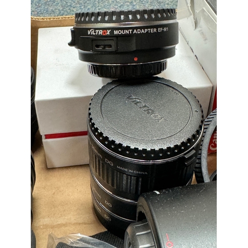 493 - ONE BOX OF CAMERA EQUIPMENT, to include a Canon 50mm f1.4 standard lens, a boxed Viltrox Canon camer... 