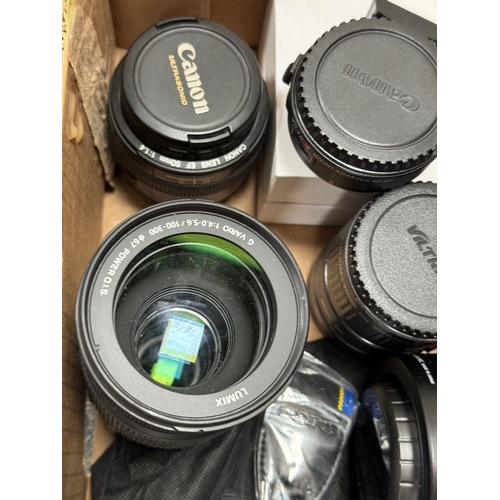 493 - ONE BOX OF CAMERA EQUIPMENT, to include a Canon 50mm f1.4 standard lens, a boxed Viltrox Canon camer... 