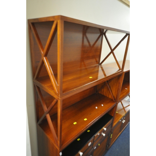 1203 - A STARBAY CUBE HARDWOOD VENEERED SECTIONAL BOOKCASE, comprising four open sections with cross ends, ... 