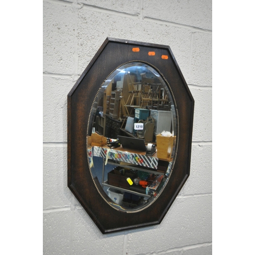 1210 - AN OAK OVAL WALL MIRROR, along with four other modern mirrors, a modern wall clock and two lamps (co... 