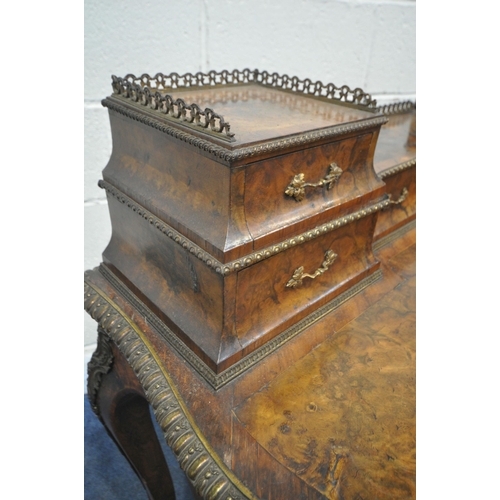 1225 - A VICTORIAN BURR WALNUT AND ROSEWOOD CROSSBANDED LADIES WRITING TABLE, with gilt brass mounts, the r... 