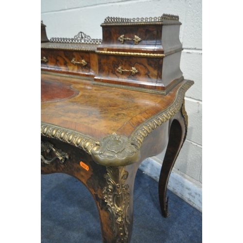 1225 - A VICTORIAN BURR WALNUT AND ROSEWOOD CROSSBANDED LADIES WRITING TABLE, with gilt brass mounts, the r... 