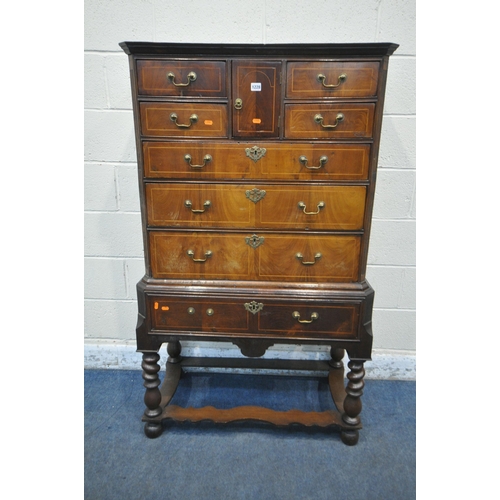 1228 - A WILLIAM AND MARY STYLE WALNUT AND BOX STRUNG CHEST ON STAND, fitted with an arrangement of eight d... 