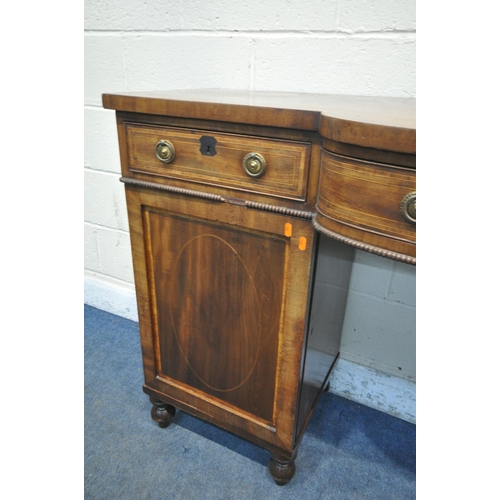 1229 - A GEORGIAN MAHOGANY AND CROSSBANDED PEDESTAL SIDEBOARD, central bowfront section, three frieze drawe... 