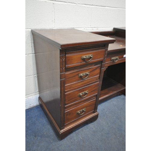 1232 - AN EDWARDIAN MAHOGANY DESK, fitted with nine drawers, on casters, width 152cm x depth 56cm x height ... 