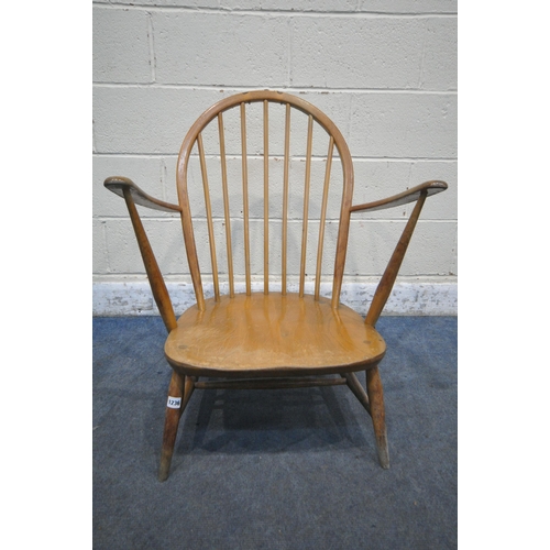 1236 - A MID CENTURY ERCOL WINDSOR ARMCHAIR, with a spindle hoop back (condition report:  water stained and... 