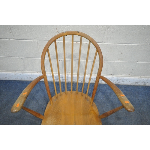 1236 - A MID CENTURY ERCOL WINDSOR ARMCHAIR, with a spindle hoop back (condition report:  water stained and... 