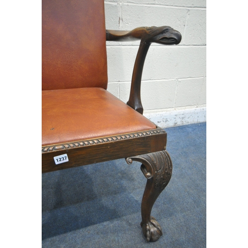 1237 - A GEORGIAN MAHOGANY ARMCHAIR, reupholstered with brown leatherette, the open armrests with an Griffi... 