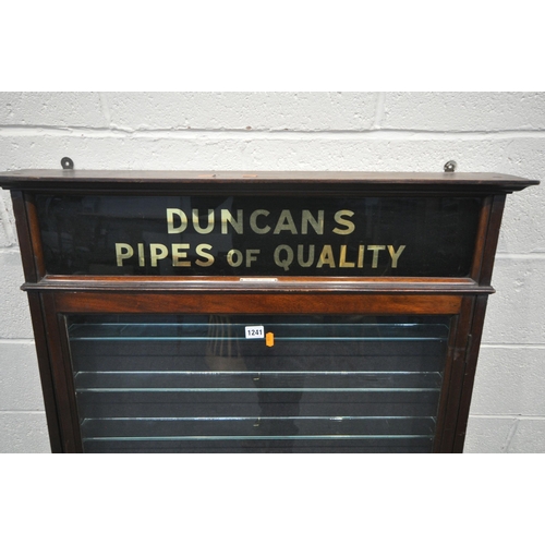 1241 - AN EARLY 20TH CENTURY MAHOGANY SINGLE DOOR DUNCAN'S PIPES OF QUALITY DISPLAY CASE, enclosing seven g... 