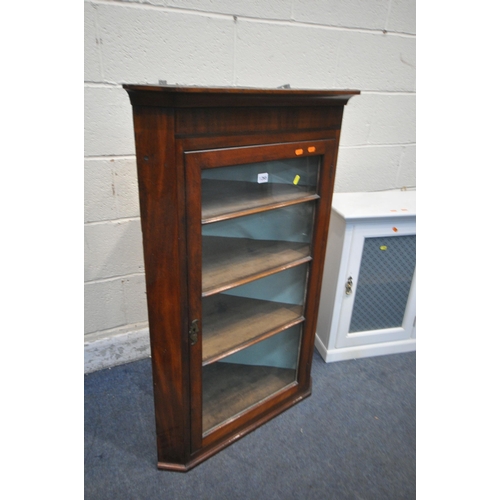 1265 - A GEORGIAN MAHOGANY GLAZED SINGLE DOOR CORNER CUPBOARD, and a painted single door unit (condition re... 