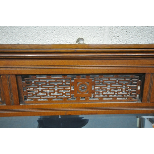 1267 - AN EDWARDIAN WALNUT OVERMANTEL MIRROR, with turned spindles and open fretwork, 110cm x 114cm (condit... 