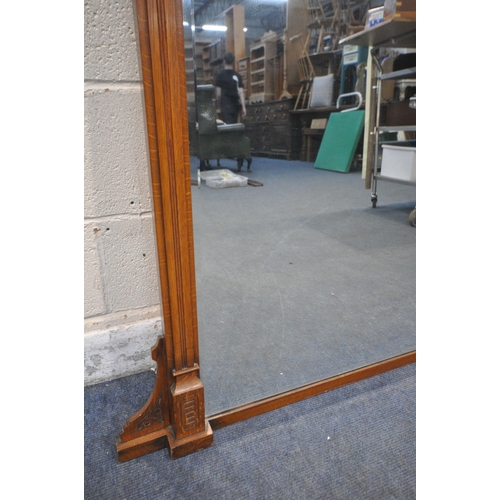 1267 - AN EDWARDIAN WALNUT OVERMANTEL MIRROR, with turned spindles and open fretwork, 110cm x 114cm (condit... 