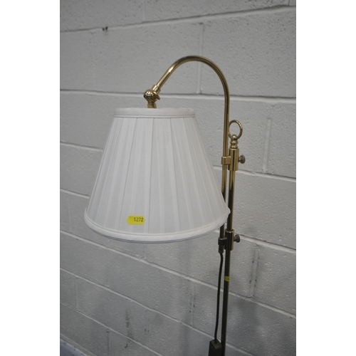 1272 - A PAIR OF BRASS STANDARD LAMPS, with an adjustable height, along with another brass lamp with a fabr... 