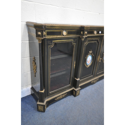 1277 - A 19TH CENTURY EBONISED AND GILT BRASS CREDENZA, with four moulded tops supporting Corinthian column... 