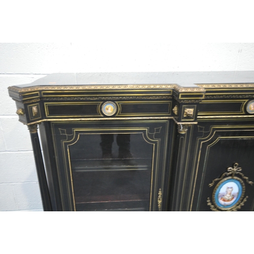 1277 - A 19TH CENTURY EBONISED AND GILT BRASS CREDENZA, with four moulded tops supporting Corinthian column... 