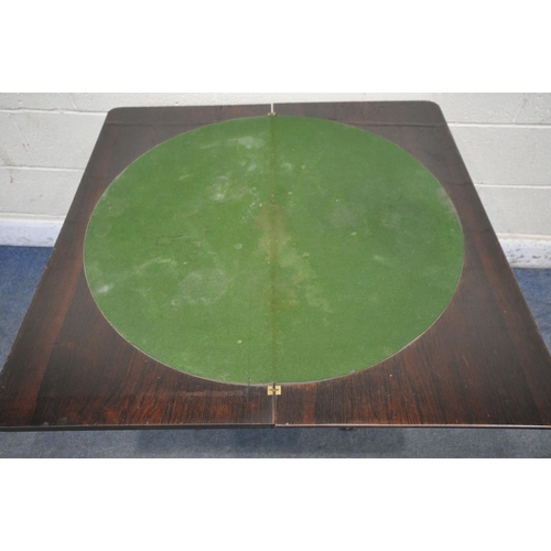 1295 - A VICTORIAN ROSEWOOD CARD TABLE, the twist and fold top enclosing a circular green baize playing sur... 