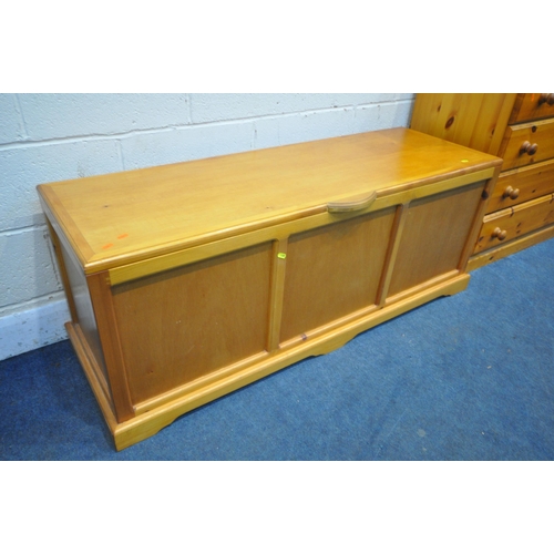 1309 - A MODERN PINE CHEST OF FOUR LONG DRAWERS, width 95cm x depth 46cm x height 92cm, and a pine blanket ... 