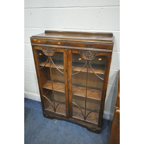 1310 - A 1940'S OAK SIDEBOARD, with two drawers and cupboard doors, width 137cm x depth 55cm x height 96cm,... 