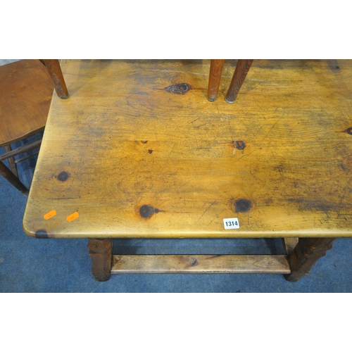 1314 - A SQUARE PINE KITCHEN TABLE, with a single drawer, on square chamfered legs, united by a cross stret... 