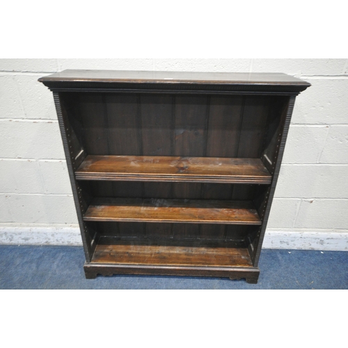 1328 - AN EARLY TO MID 20TH CENTURY OAK OPEN BOOKCASE, with three adjustable shelves, width 101cm x depth 2... 