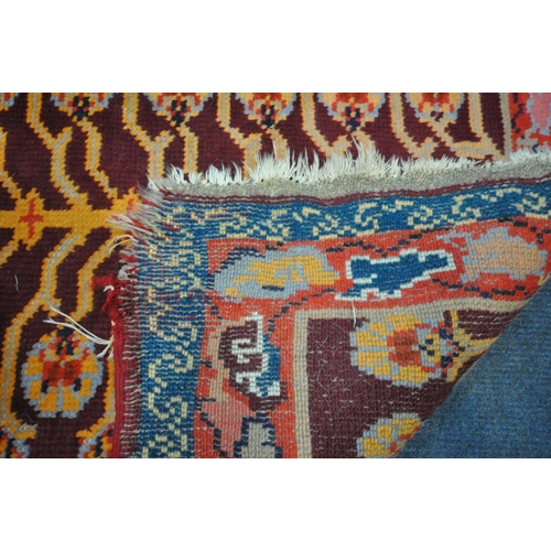 1330 - TWO PERSIAN GEOMETRIC PATTERNED RUGS, of various colours, largest rug measurements, 185cm x 105cm, a... 