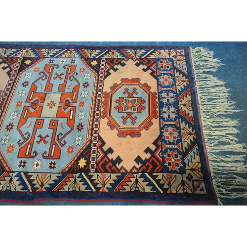 1330 - TWO PERSIAN GEOMETRIC PATTERNED RUGS, of various colours, largest rug measurements, 185cm x 105cm, a... 