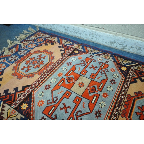 1330 - TWO PERSIAN GEOMETRIC PATTERNED RUGS, of various colours, largest rug measurements, 185cm x 105cm, a... 