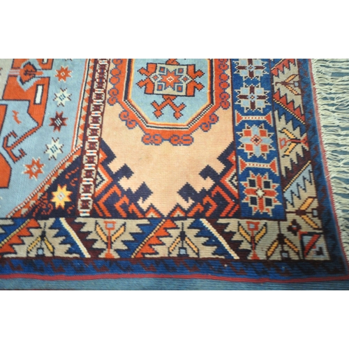 1330 - TWO PERSIAN GEOMETRIC PATTERNED RUGS, of various colours, largest rug measurements, 185cm x 105cm, a... 