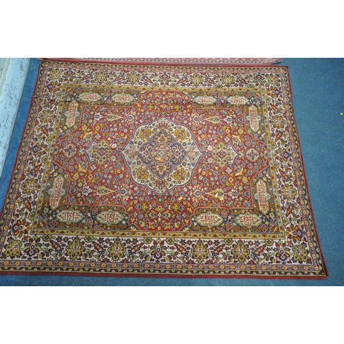 1333 - TWO 20TH CENTURY SYNTHETIC SILK RUGS, of two colours and intricate designs, 182cm x 145cm (condition... 